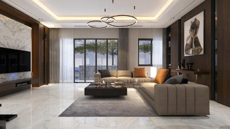 Thiết kế nội thất phòng khách biệt thự rộng nổi bật với phong cách hiện đại nổi bật bộ sofa góc lớn cách điệu với đường kẻ sọc trang trí đẹp mắt.